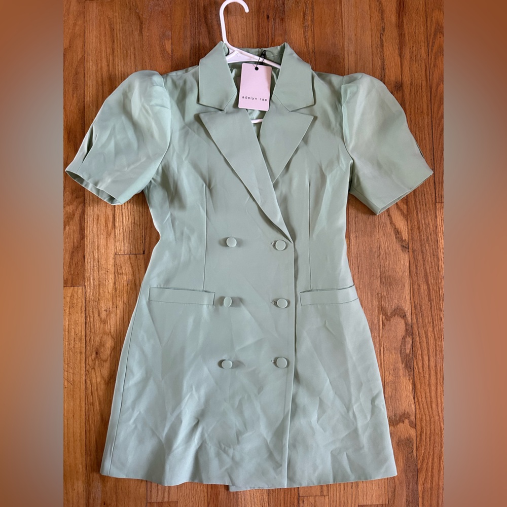 Brand new Adelyn Rae dress with tags. Size small